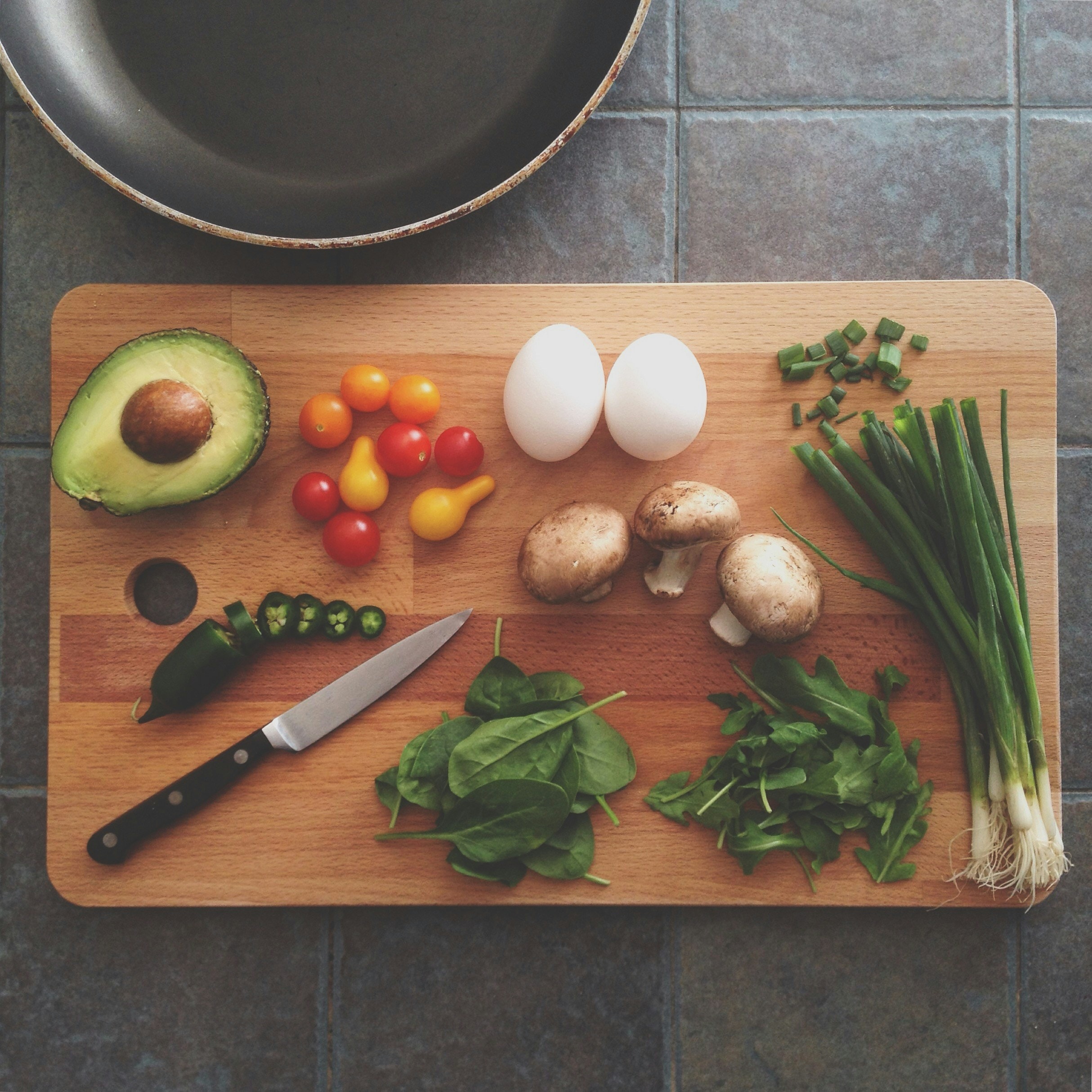 A happy family cooking together in a modern kitchen
